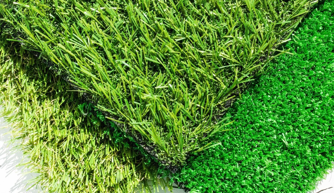 Various eco-friendly artificial grass samples showing texture and quality